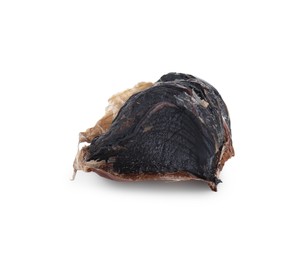 Photo of Clove of fermented black garlic isolated on white