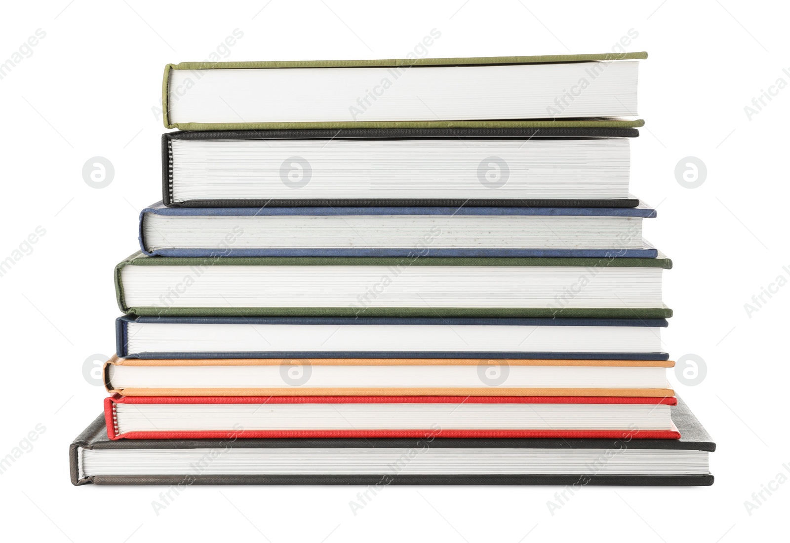 Photo of Many different books stacked on white background