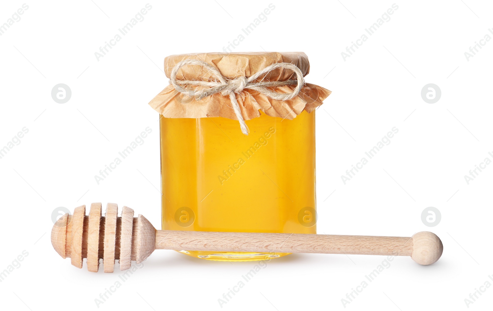 Photo of Tasty honey in glass jar and dipper isolated on white