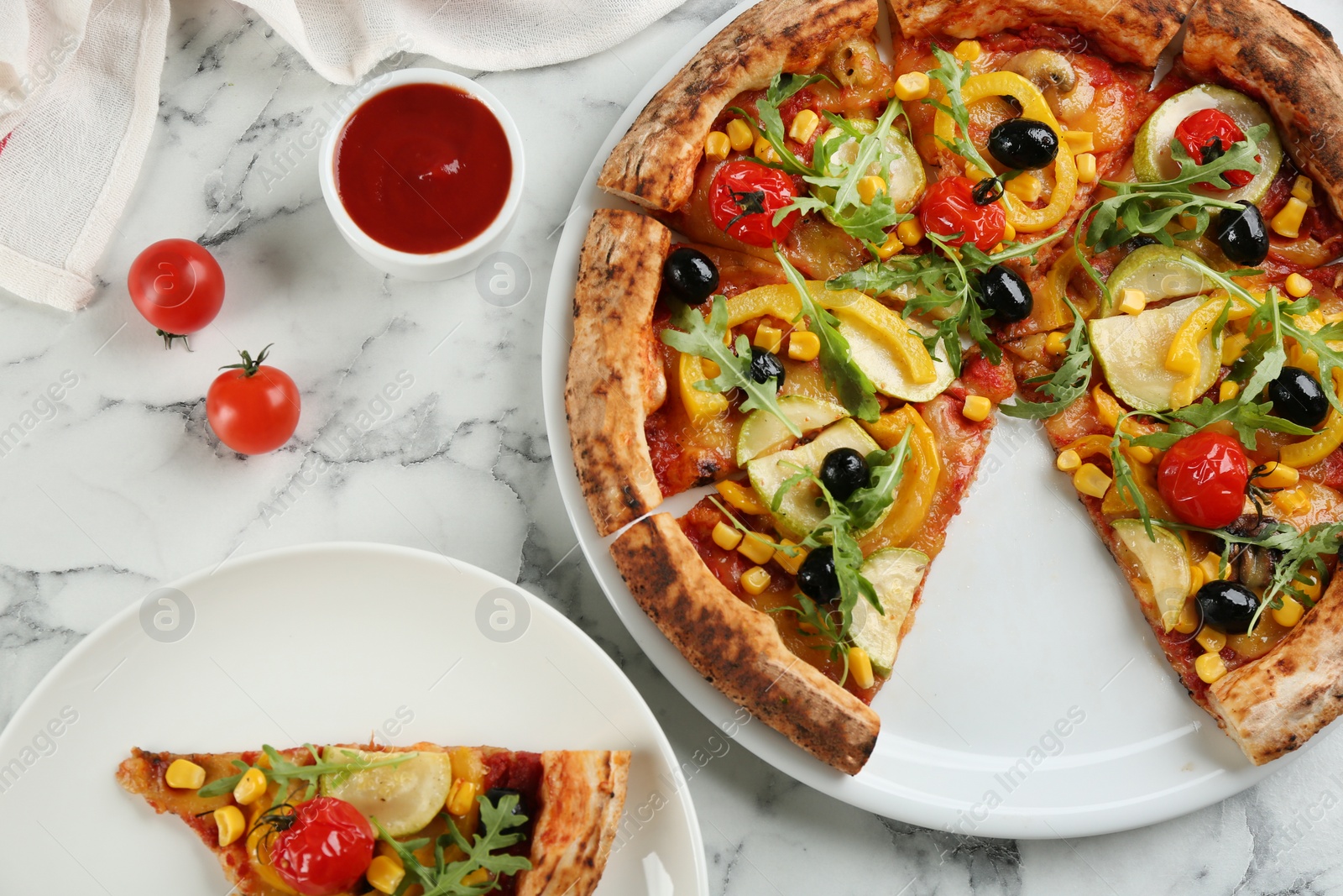 Photo of Delicious vegetable pizza on white marble table, flat lay