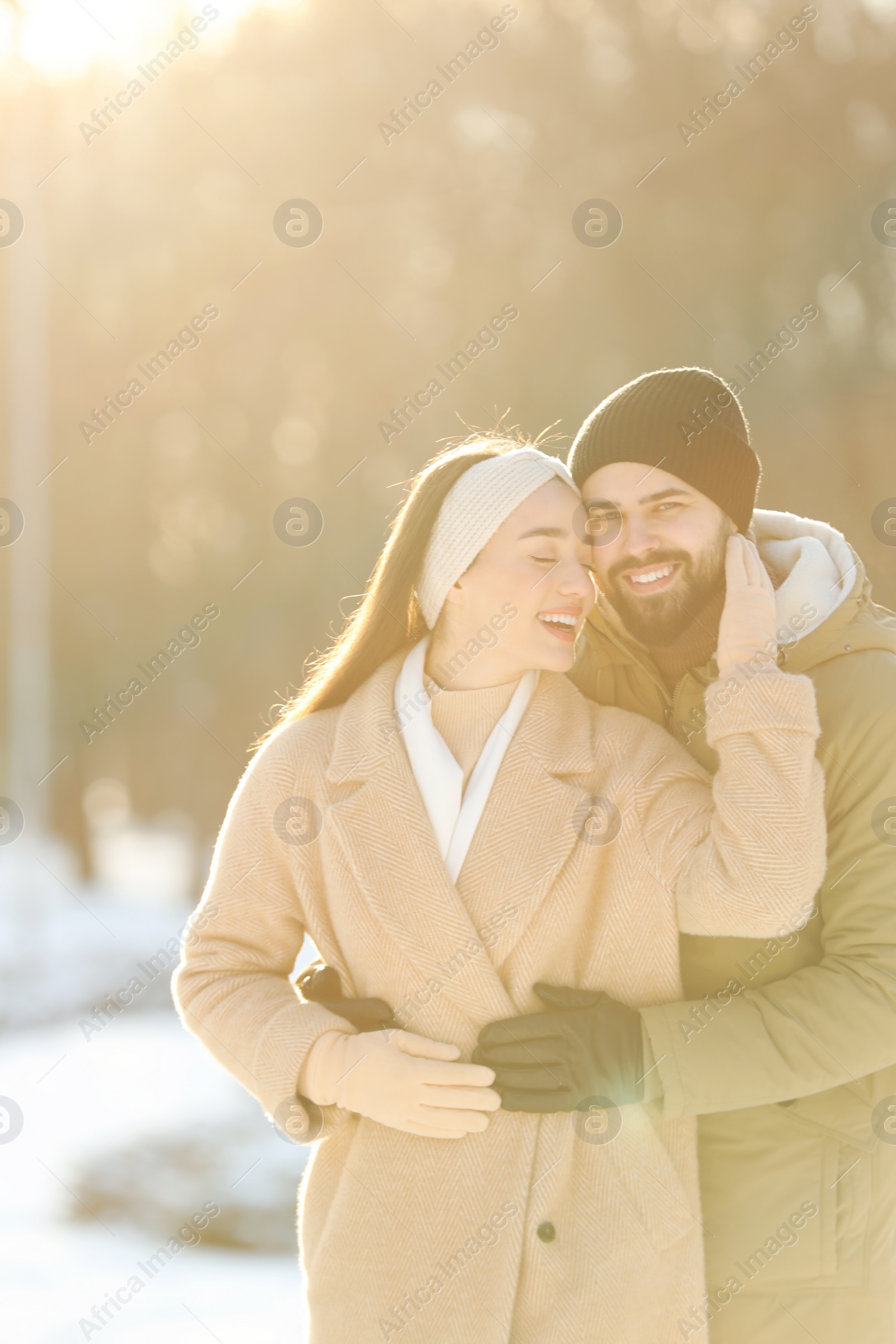 Photo of Beautiful young couple enjoying winter day outdoors