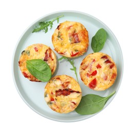 Photo of Freshly baked bacon and egg muffins with cheese isolated on white, top view