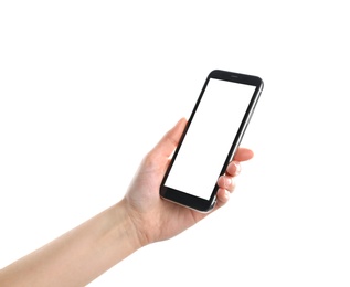 Photo of Woman holding smartphone with blank screen on white background, closeup of hand. Space for text