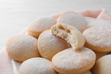 Traditional cookies for Islamic holidays on table, closeup. Eid Mubarak