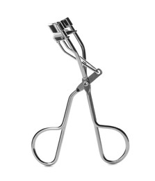 Photo of Eyelash curler isolated on white. Makeup tool