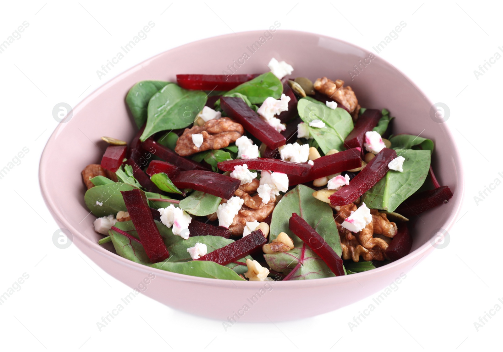 Photo of Delicious beet salad with feta cheese and walnuts in bowl isolated on white