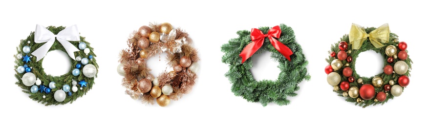 Image of Set with beautiful Christmas wreaths on white background, banner design