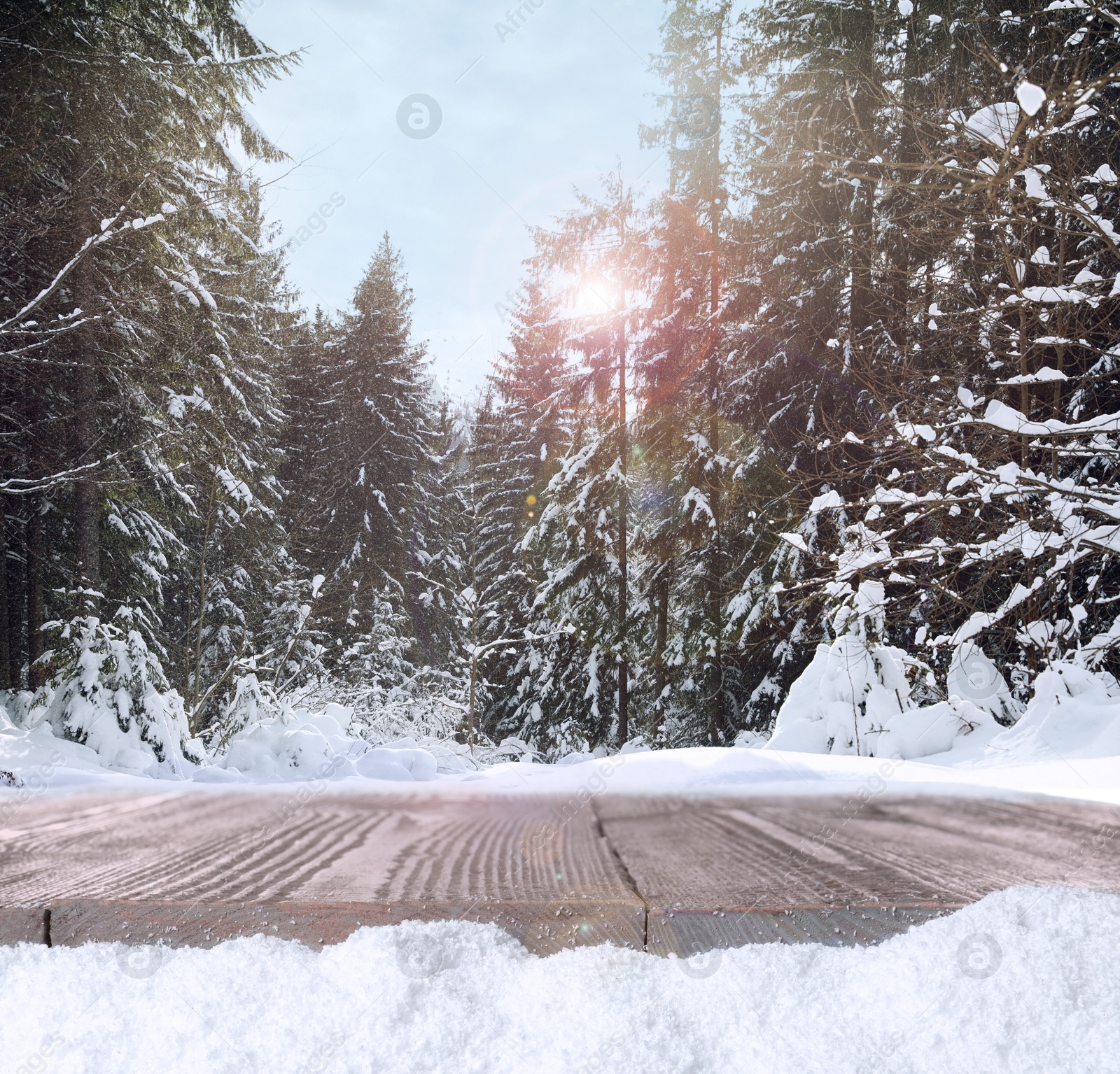 Image of Wooden surface and beautiful view of winter landscape 