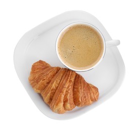 Photo of Fresh croissant and coffee isolated on white, top view. Tasty breakfast