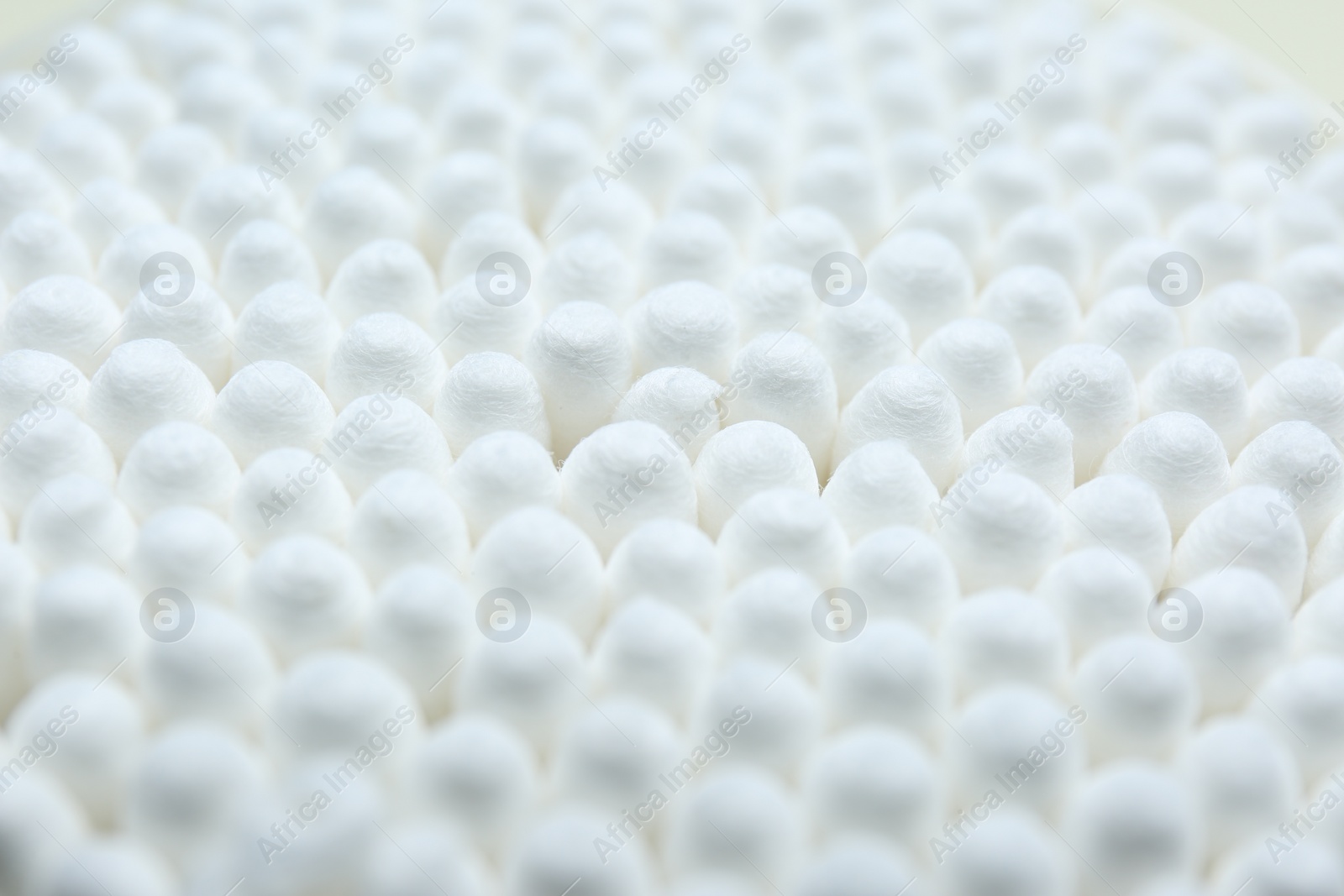 Photo of Many cotton buds as background, closeup view