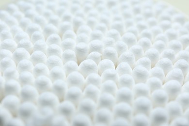 Many cotton buds as background, closeup view