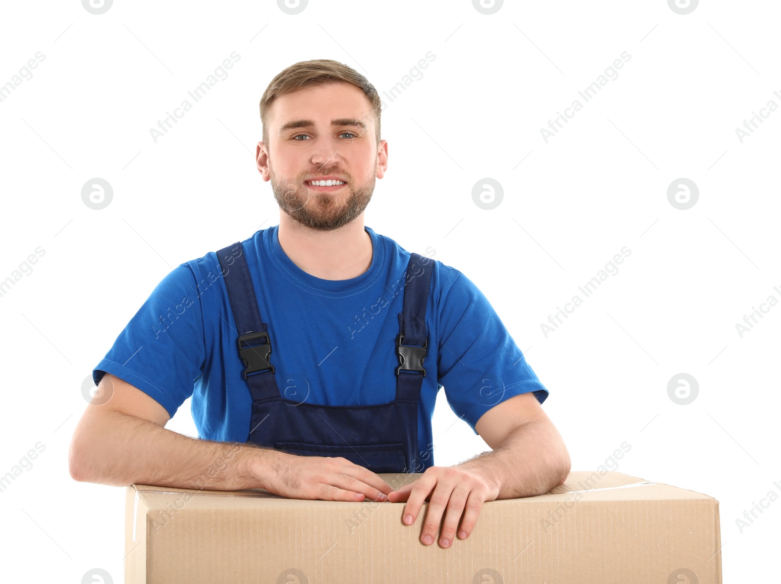 Photo of Young worker with box isolated on white. Moving service
