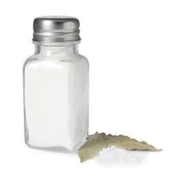 Photo of Salt shaker and bay leaves isolated on white