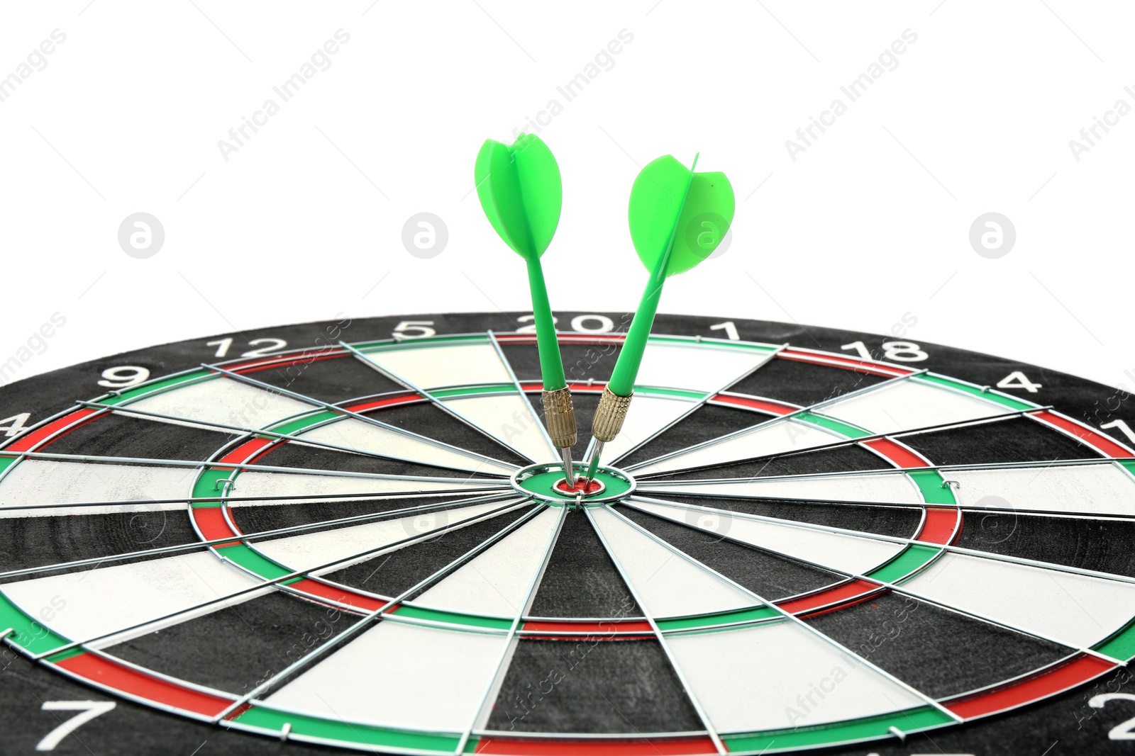 Photo of Dart board with color arrows hitting target, closeup