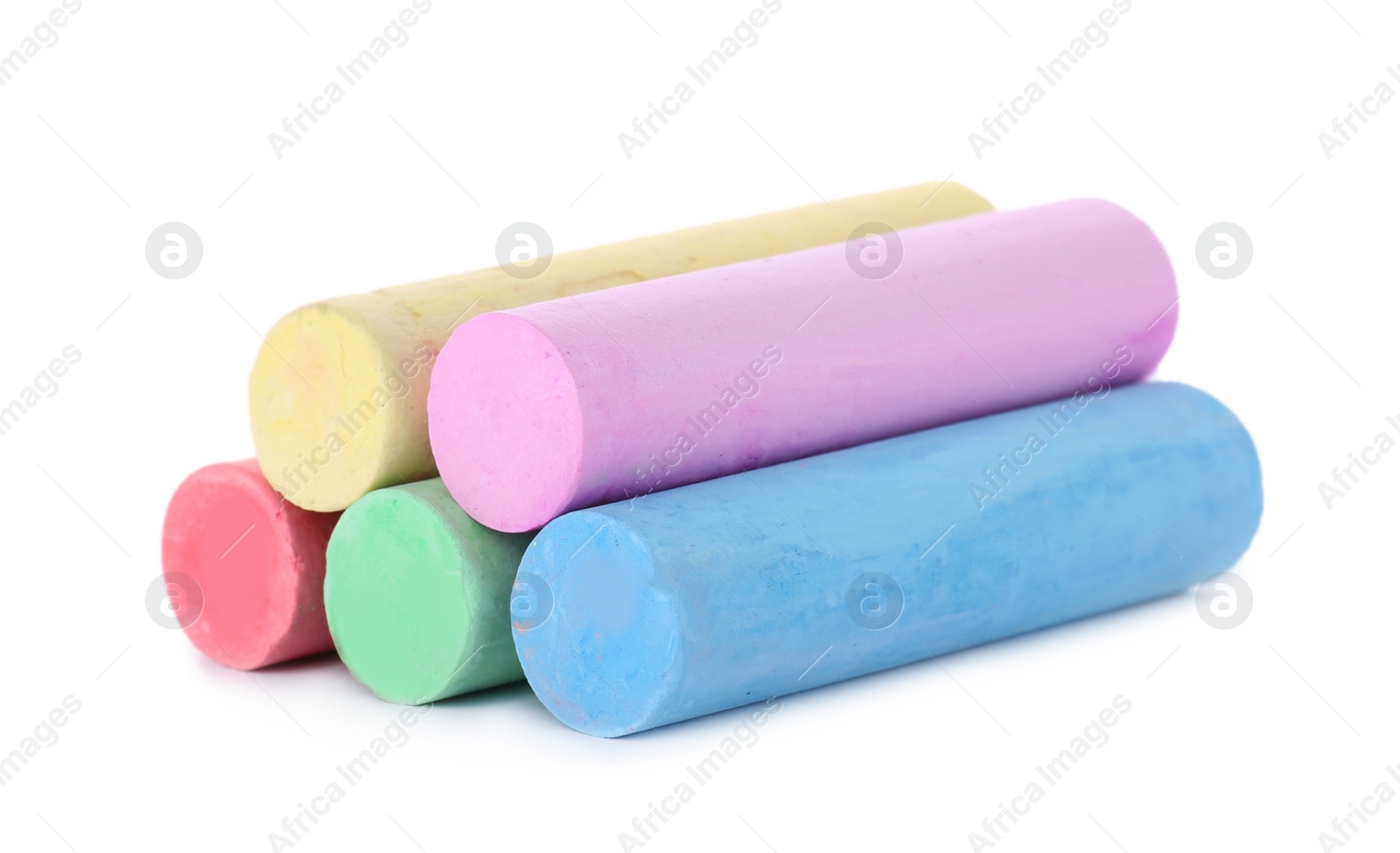 Photo of Color pieces of chalk on white background