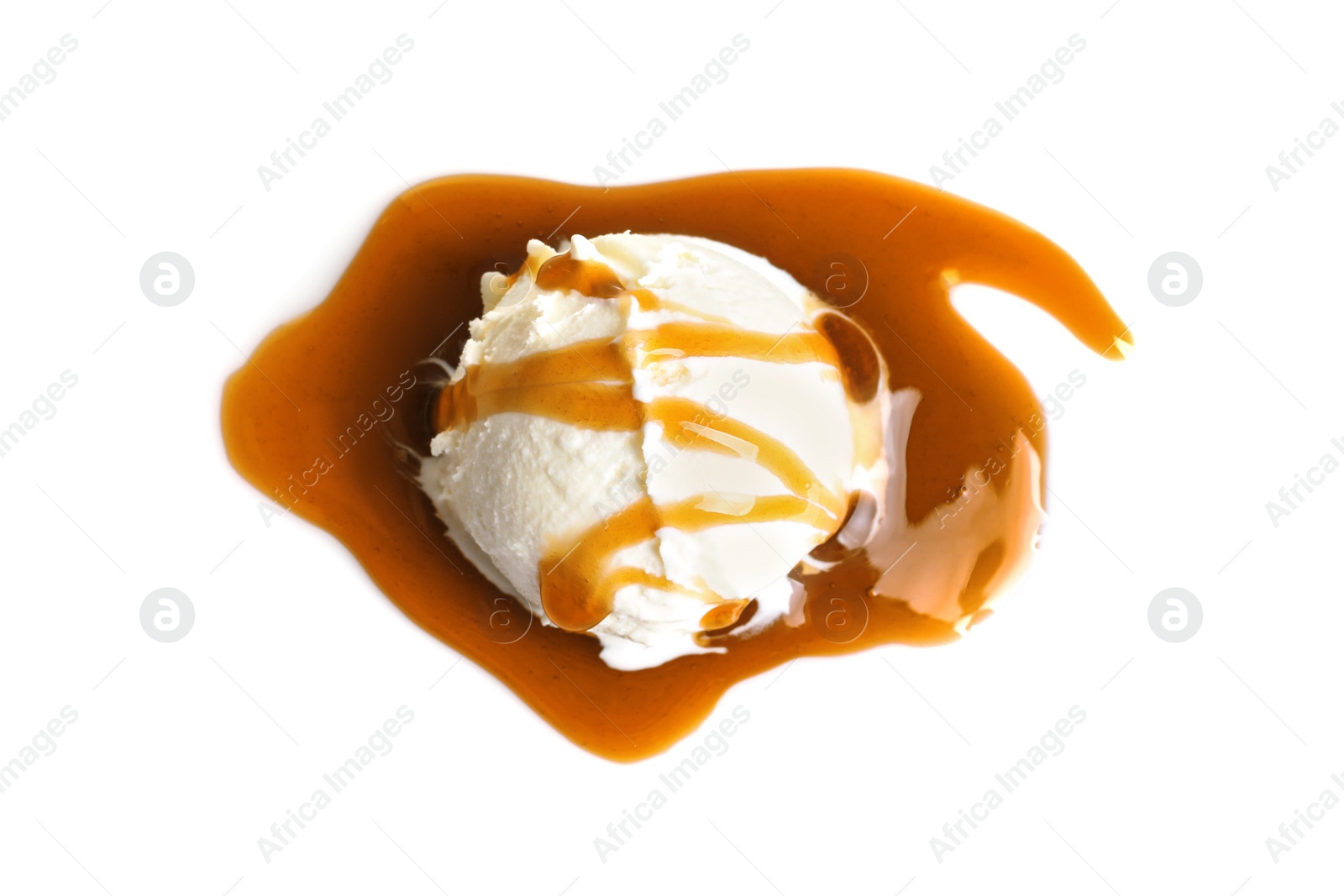 Photo of Tasty ice cream ball with caramel sauce on white background