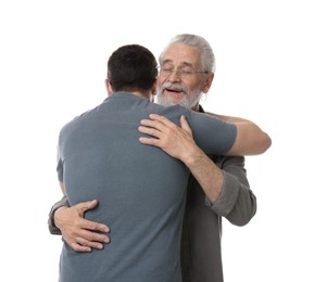 Happy dad and his son hugging on white background