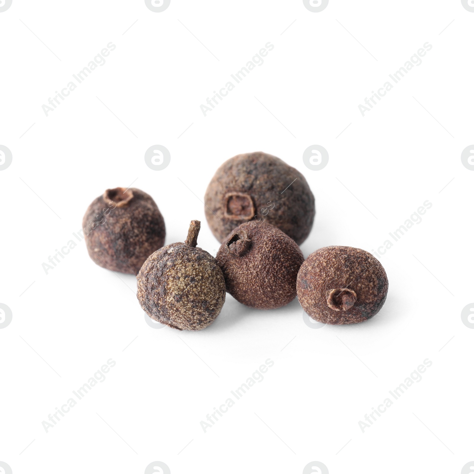 Photo of Spicy black pepper grains isolated on white