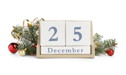 Photo of Wooden block calendar and decor on white background. Christmas celebration