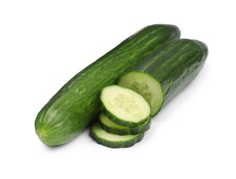 Photo of Whole and cut long cucumbers isolated on white