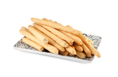 Photo of Delicious grissini isolated on white. Crusty breadsticks