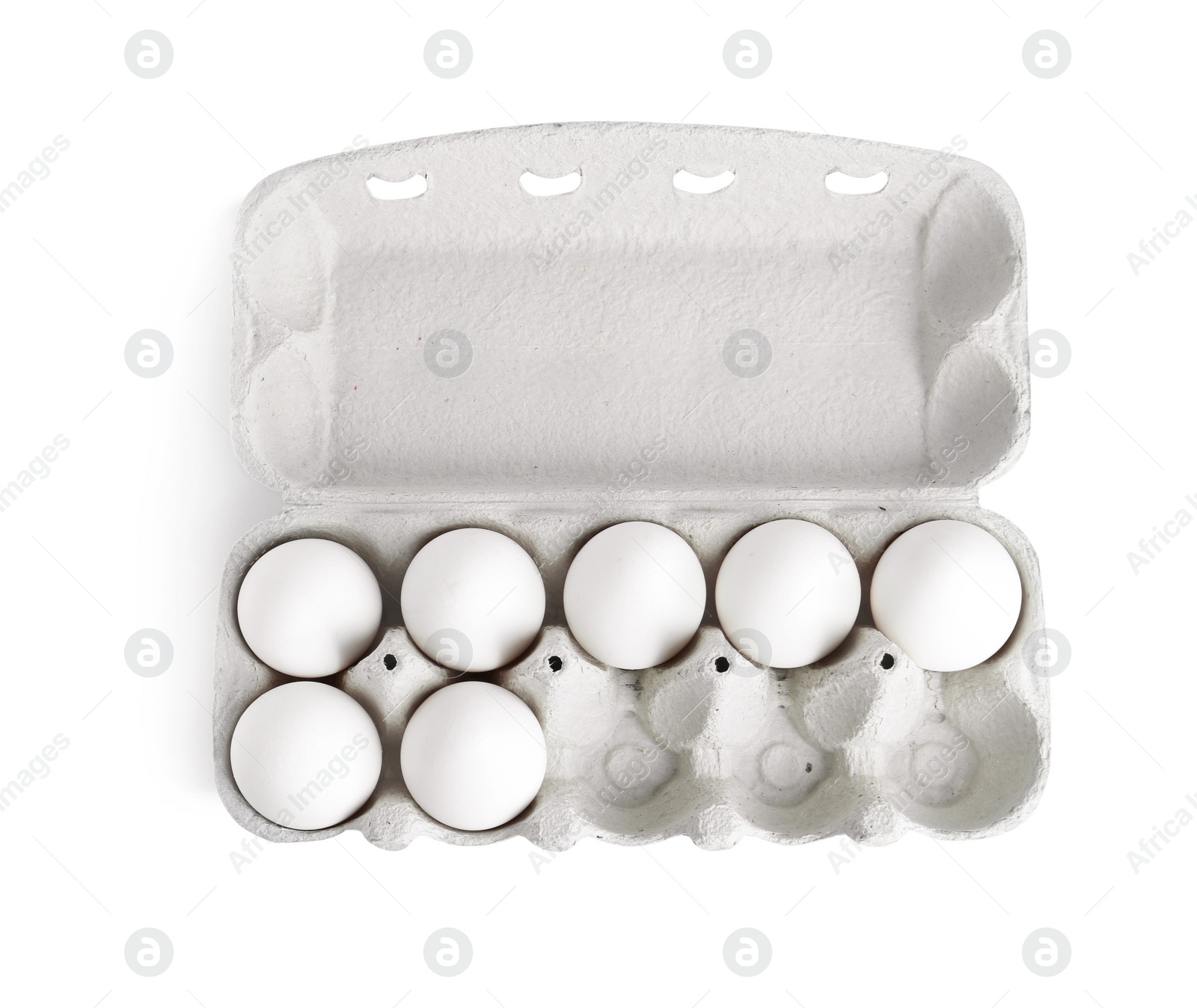 Photo of Chicken eggs in cardboard box isolated on white, top view