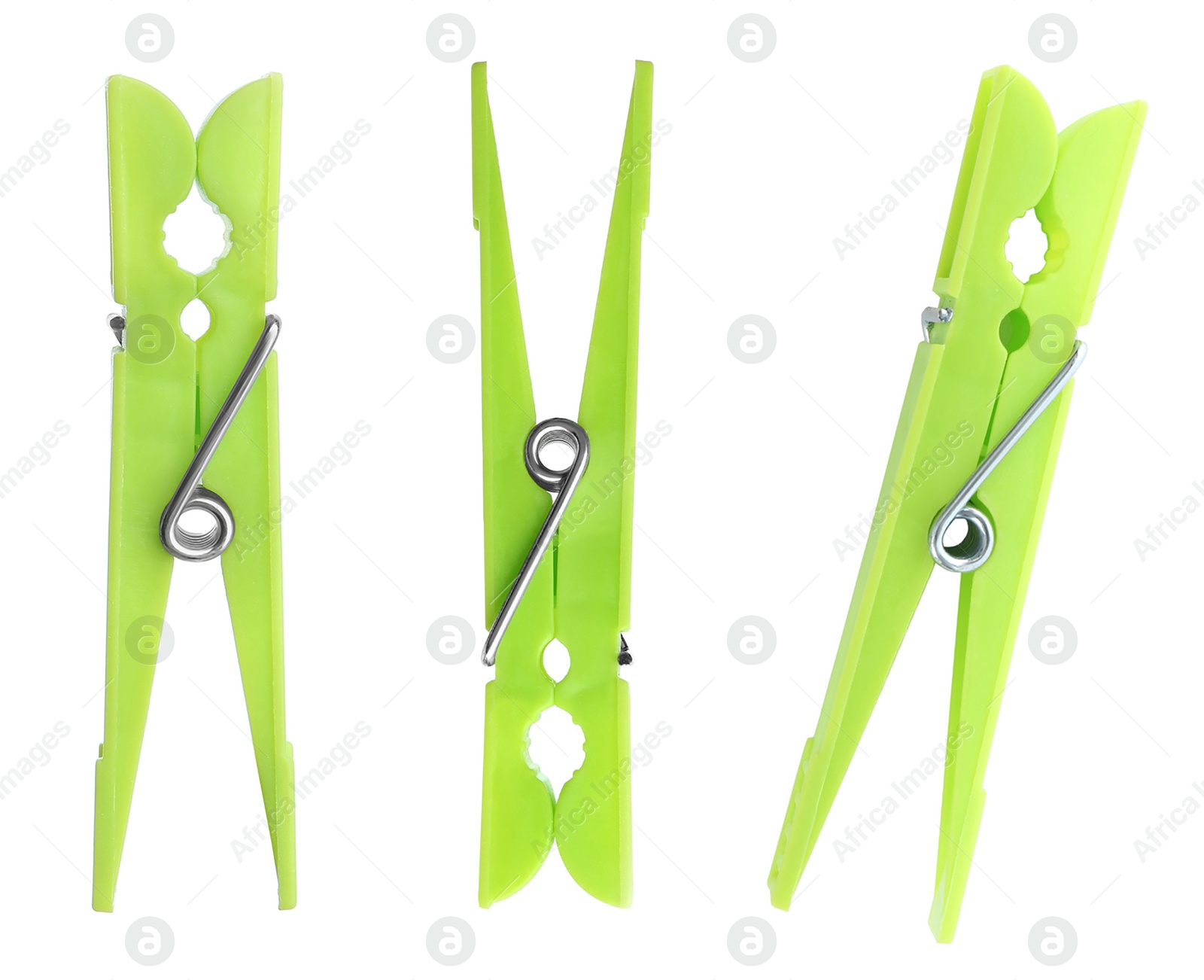 Image of Set with green plastic clothespins on white background