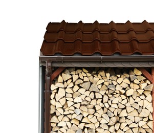 Photo of Stacked firewood near white wall outdoors, space for text. Heating in winter