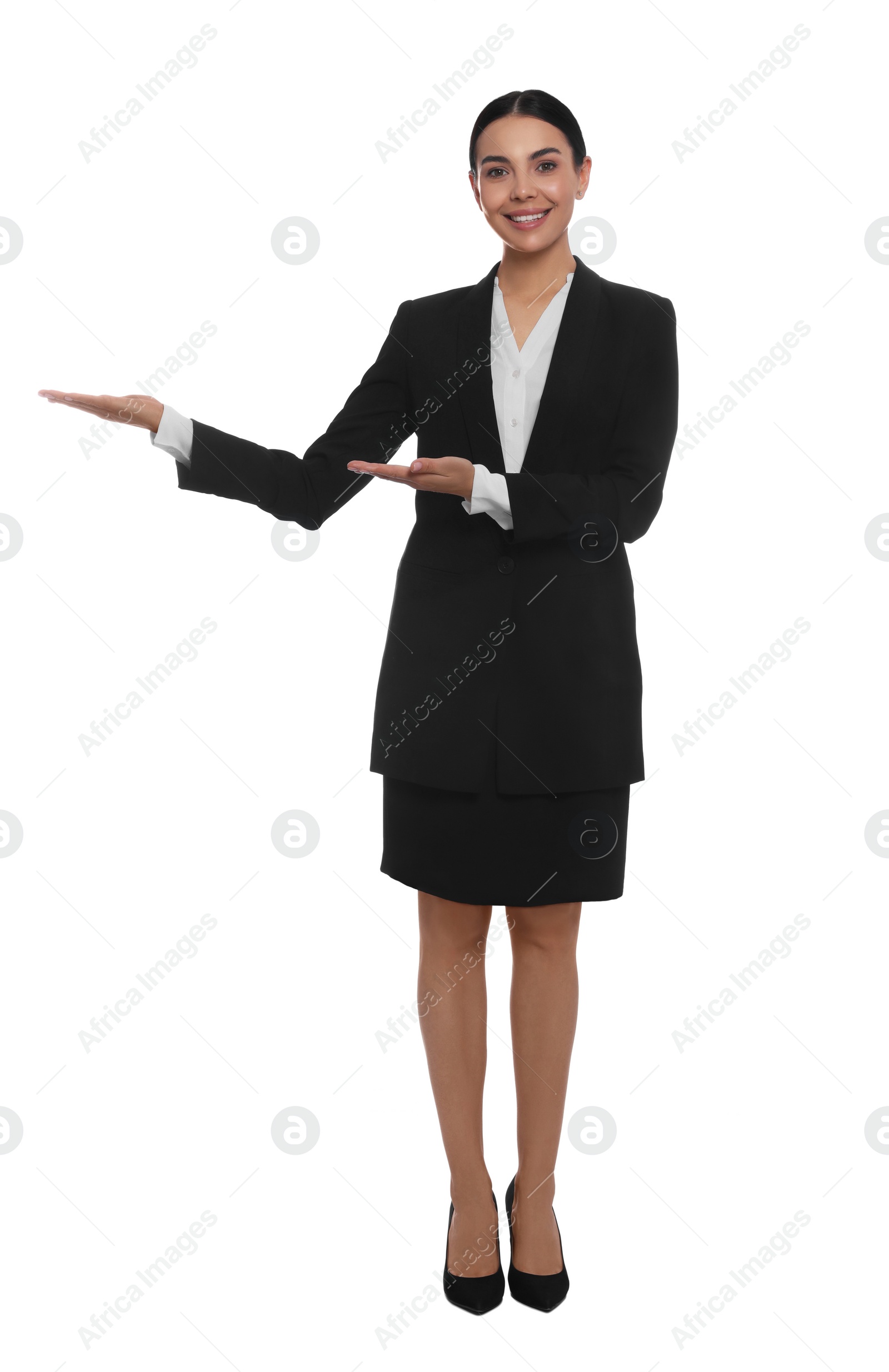 Photo of Full length portrait of hostess in uniform on white background