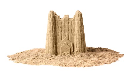 Photo of Pile of sand with beautiful castle isolated on white. Outdoor play