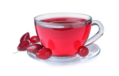 Photo of Glass cup of fresh dogwood tea and berries on white background