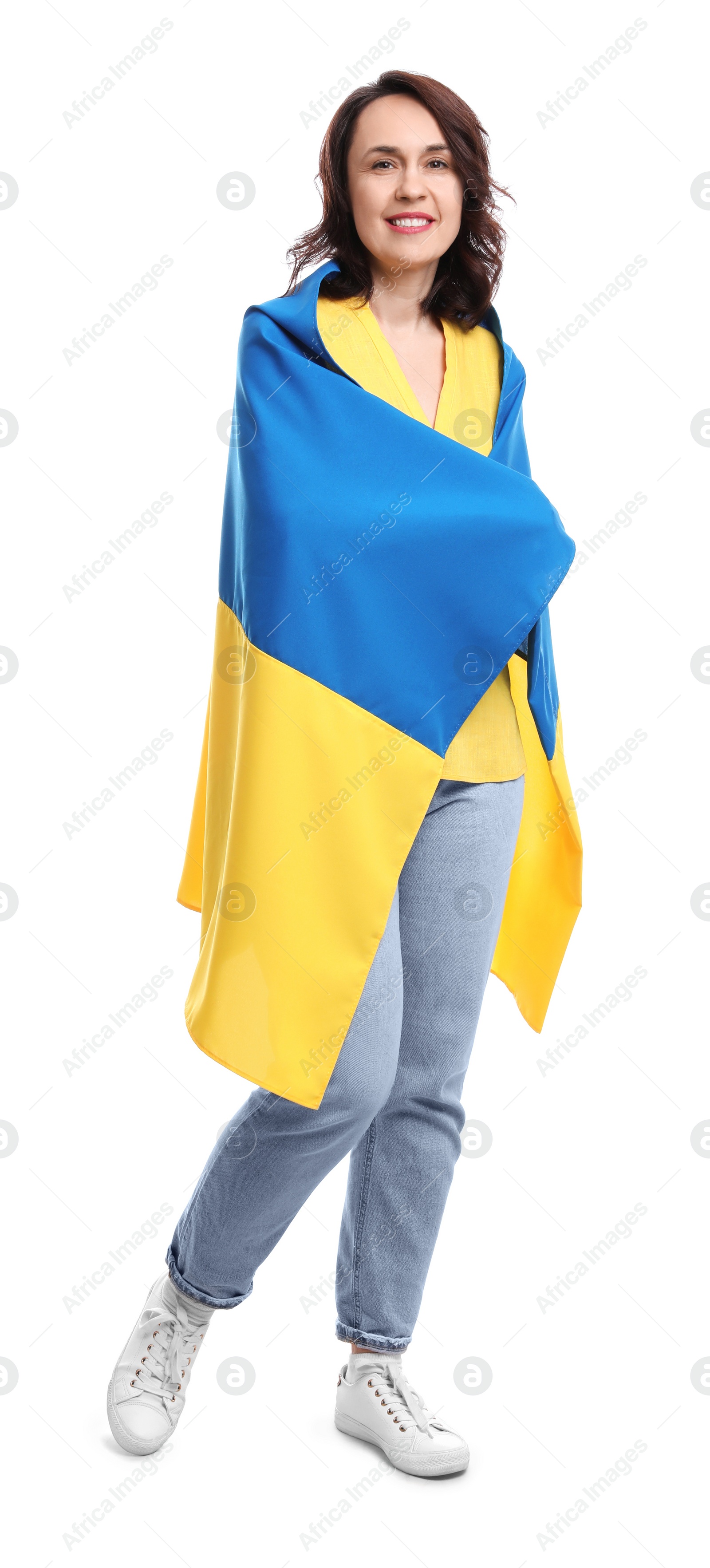 Photo of Happy woman with flag of Ukraine on white background