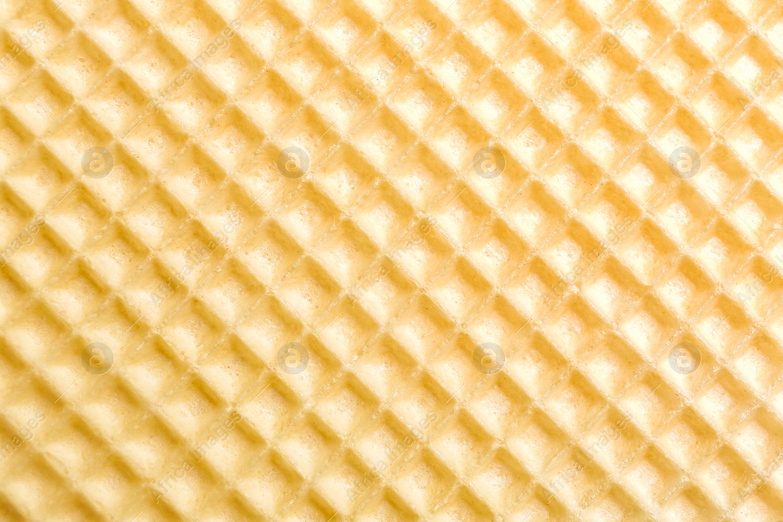 Photo of Tasty wafer as background, closeup. Crispy food