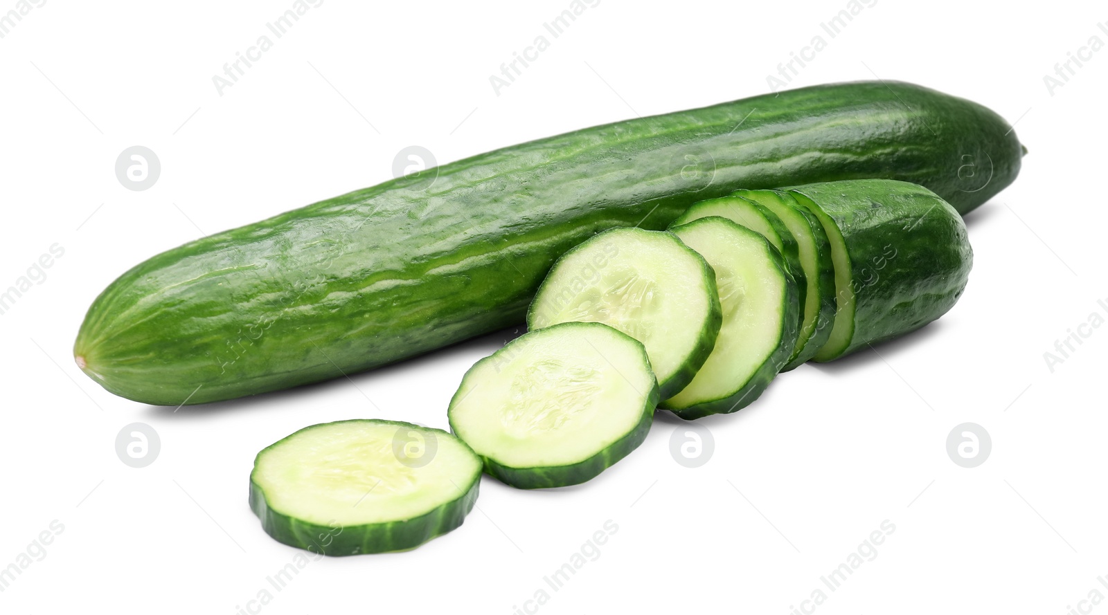 Photo of Whole and cut long cucumbers isolated on white