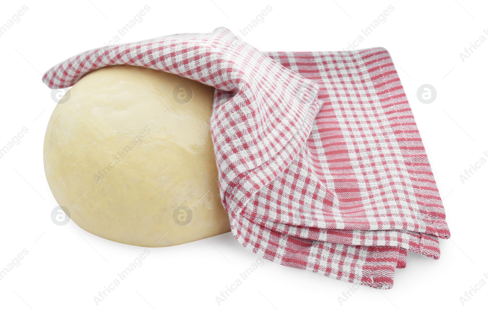 Photo of Fresh yeast dough and towel isolated on white