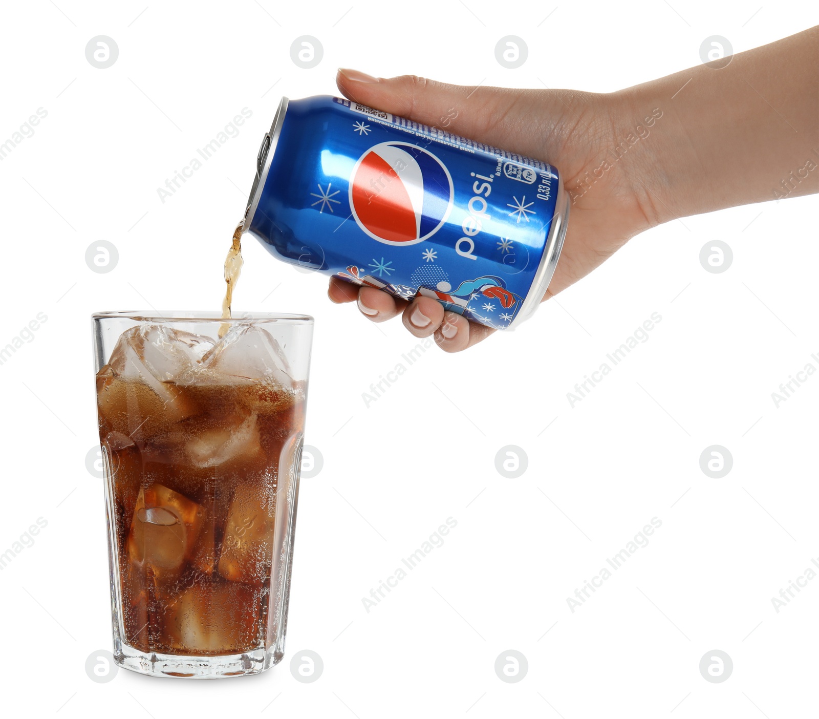 Photo of MYKOLAIV, UKRAINE - FEBRUARY 10, 2021: Woman pouring Pepsi into glass with ice on white background, closeup