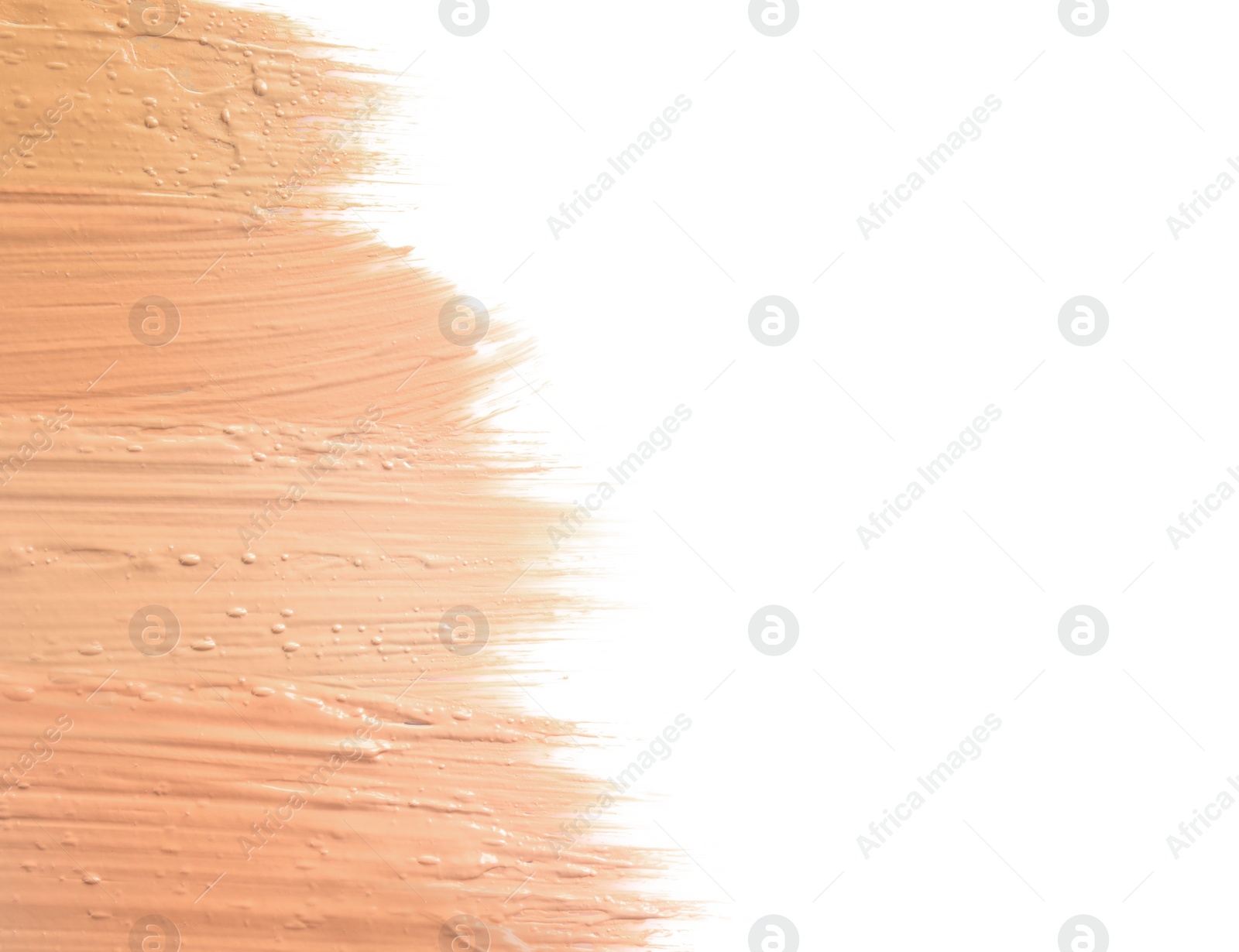 Photo of Samples of different foundation shades on white background, top view