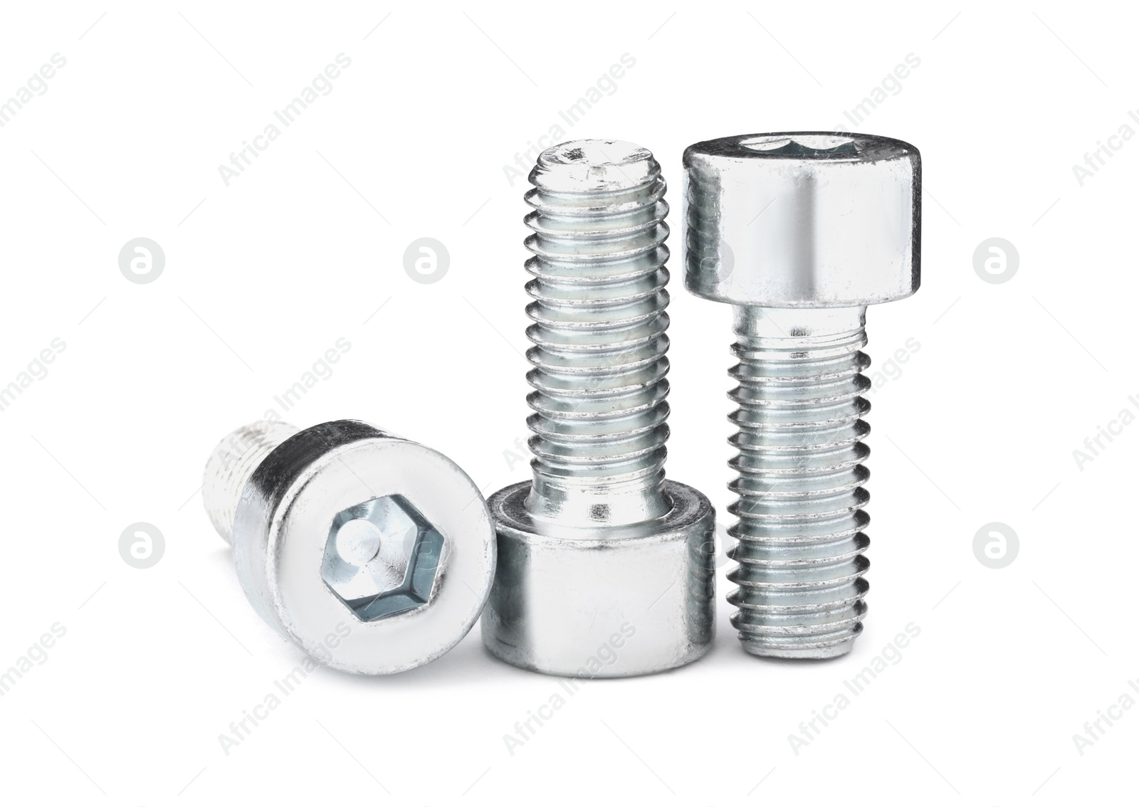 Photo of Metal socket screws isolated on white. Hardware tools