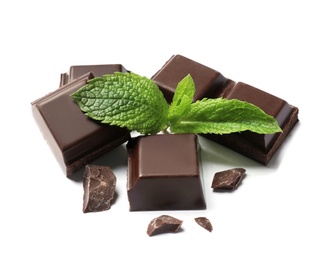 Photo of Pieces of dark chocolate with mint on white background