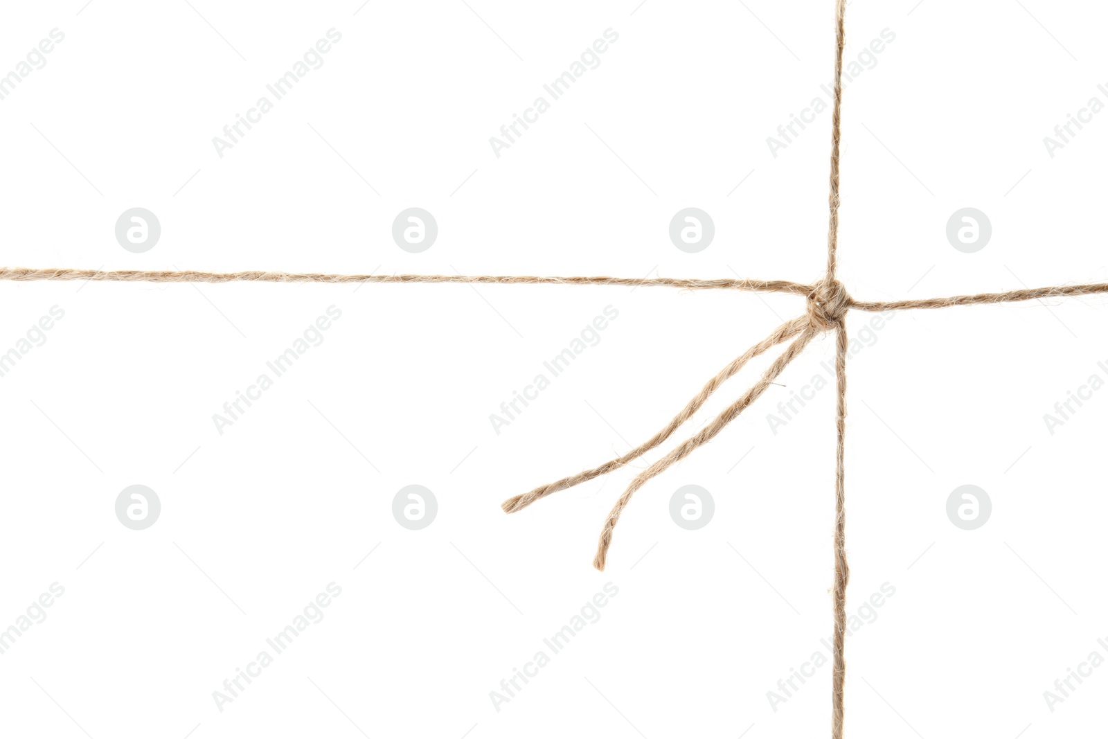 Photo of Hemp rope with knot on white background. Organic material