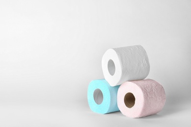 Photo of Rolls of toilet paper on white background. Space for text