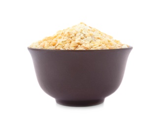 Photo of Bowl of granulated dry garlic on white background