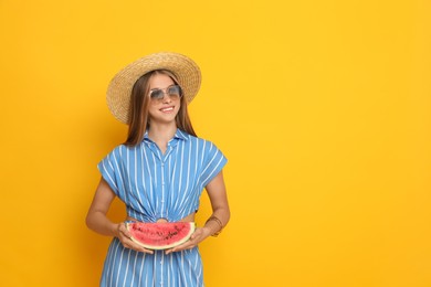 Photo of Beautiful girl with slice of watermelon on yellow background. Space for text