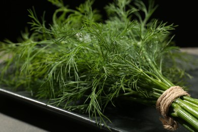 Bunch of fresh dill on table, closeup