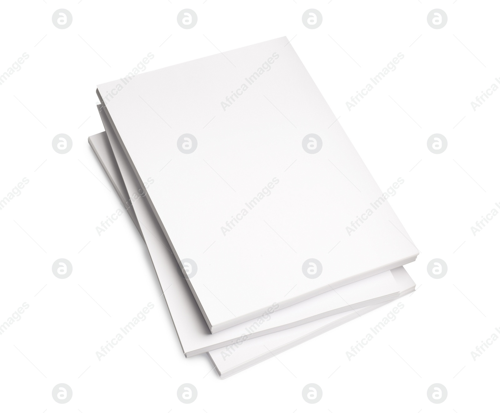 Photo of Stacks of paper sheets on white background