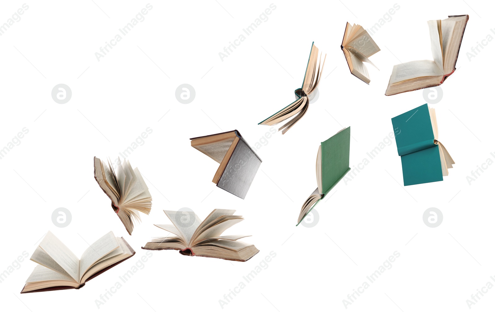 Image of Many hardcover books flying on white background