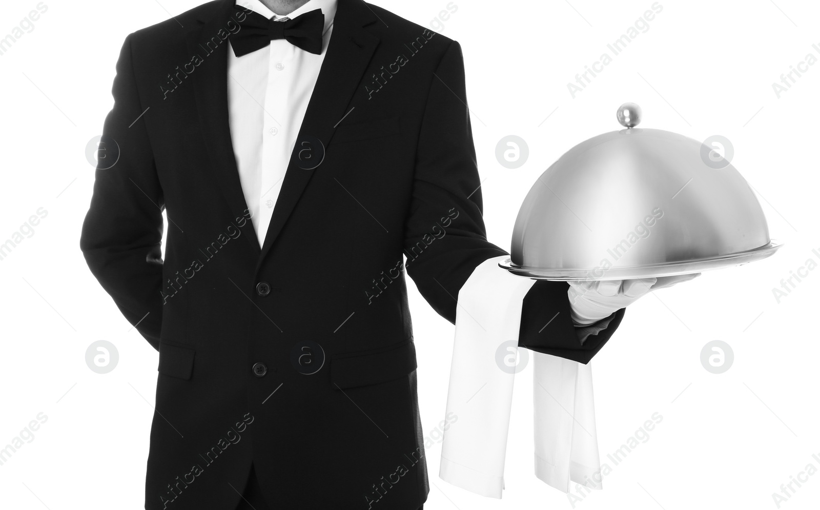 Photo of Waiter holding metal tray with lid on white background, closeup