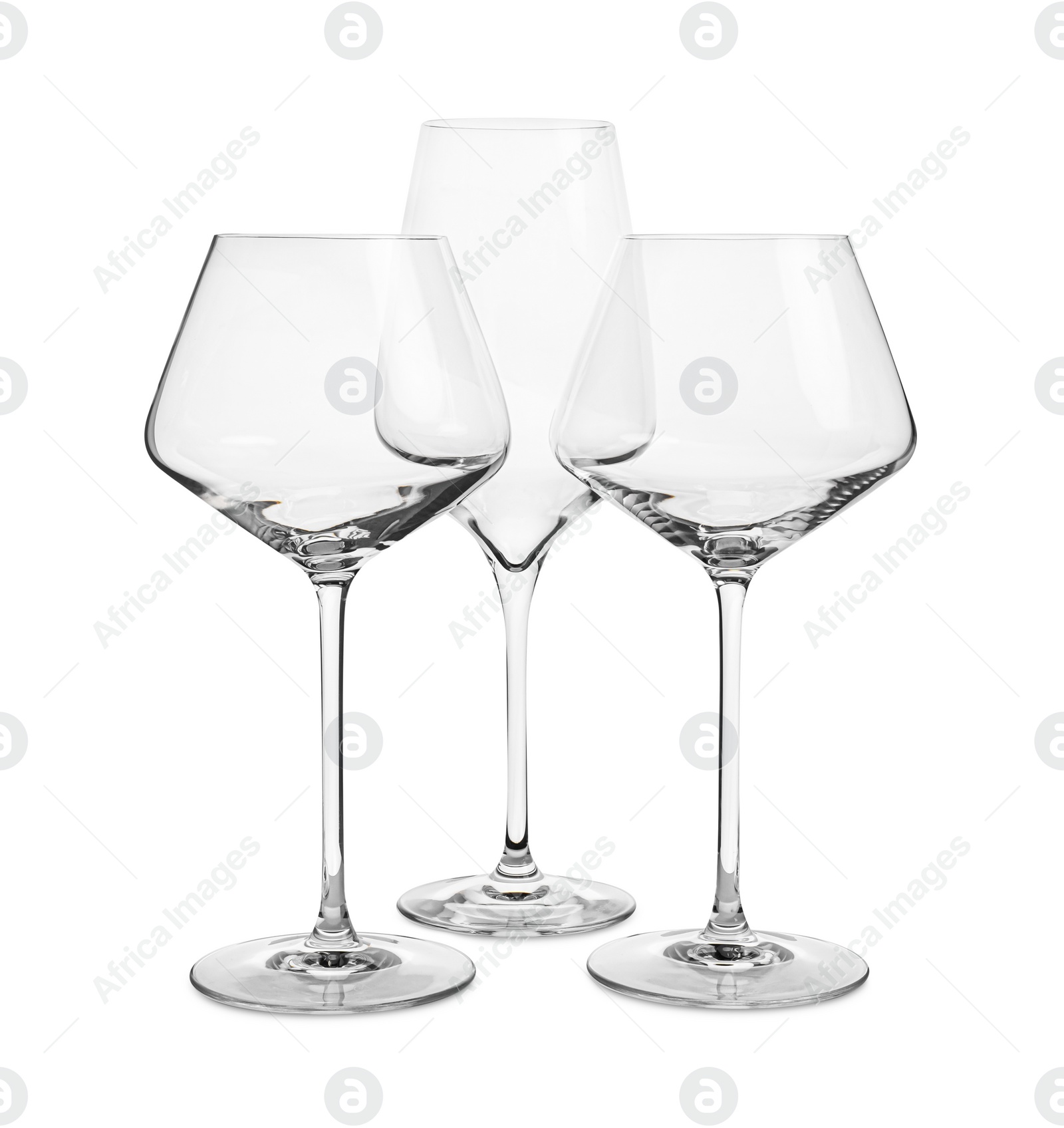 Photo of Elegant clean empty wine glasses isolated on white