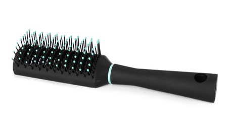 One new plastic hairbrush isolated on white