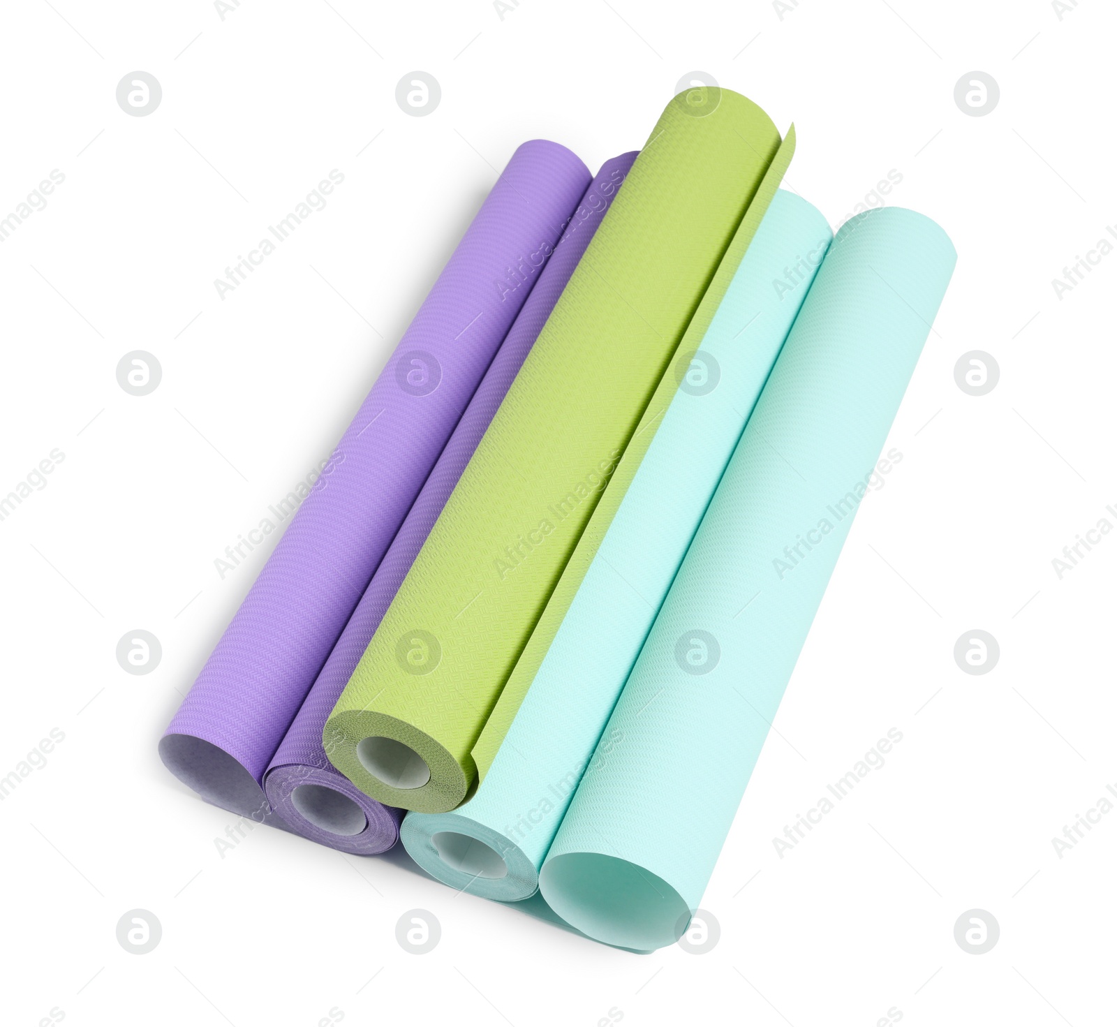 Photo of Three colorful wallpaper rolls isolated on white